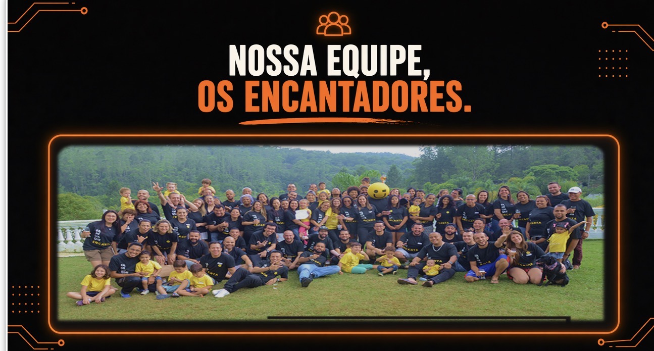 Equipe Encanto reunida em evento presencial